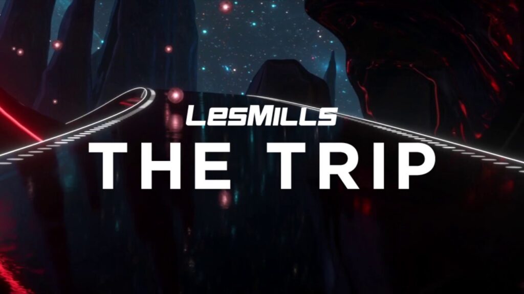 Les Mills The Trip : Cyclisme Immersif et Fitness Virtuel Logo Les Mills The Trip dans un univers virtuel futuriste avec sentiers lumineux pour cyclisme immersif.